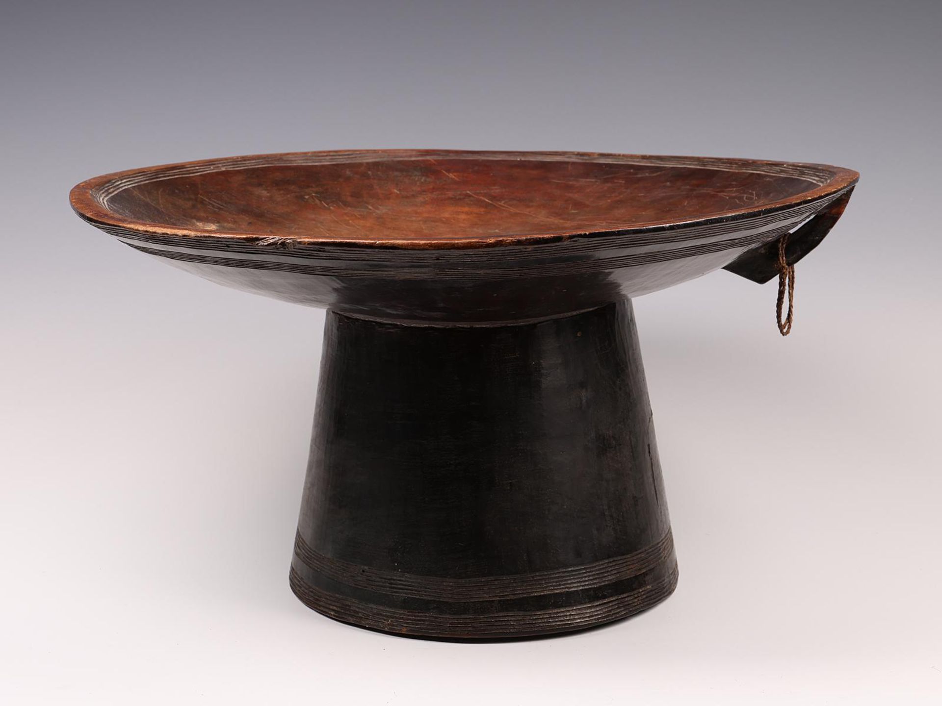 Ethiopia, a fine wooden food platter on a conical stand