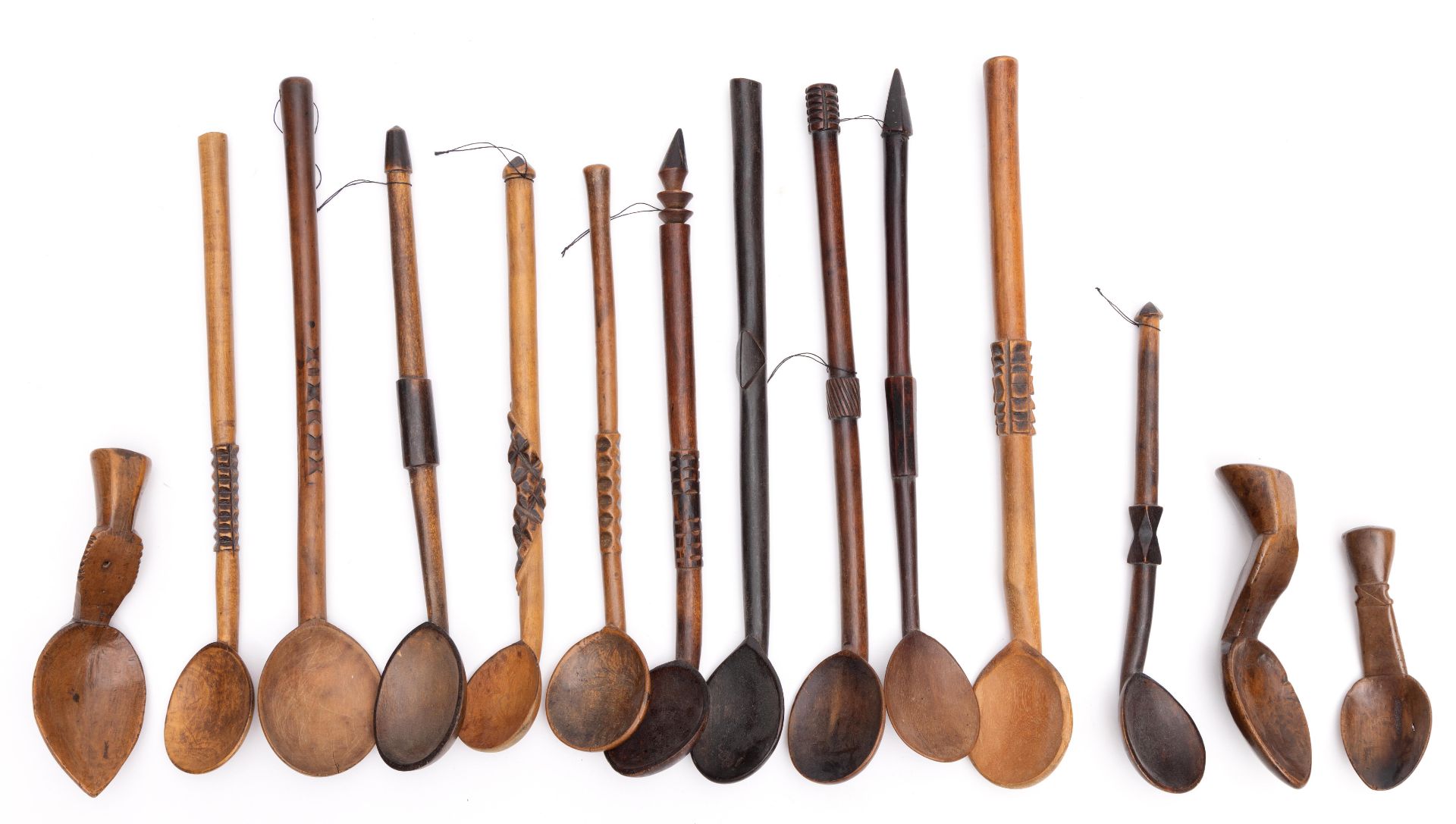 East Africa, a collection of eleven wooden spoons, a South African large spoon and Kulango, three ce