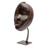 Ivory Coast, Dan mask with old collection number on the back.