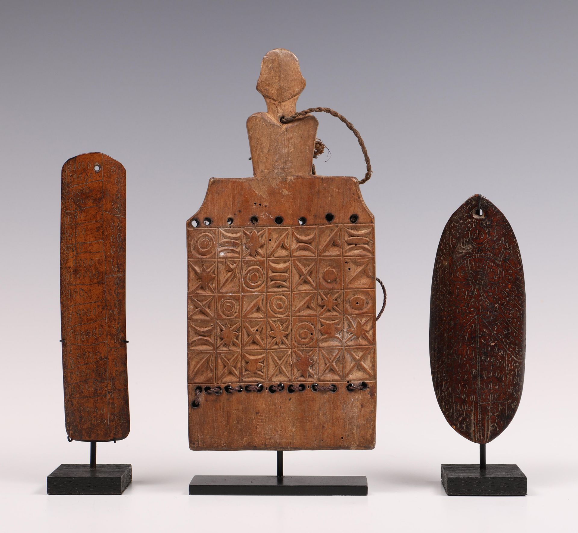 Sumatra, Batak, a carved wooden calender and a bamboo calender;