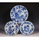China, three blue and white porcelain 'aster' plates, 18th century,