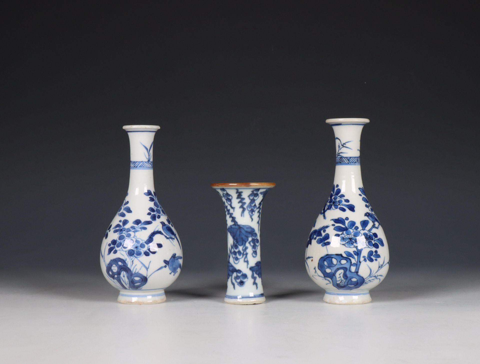 China, pair of small blue and white porcelain bottle vases, 18th century,