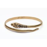 18 kt. Gouden stijve armband in de vorm van een slang.