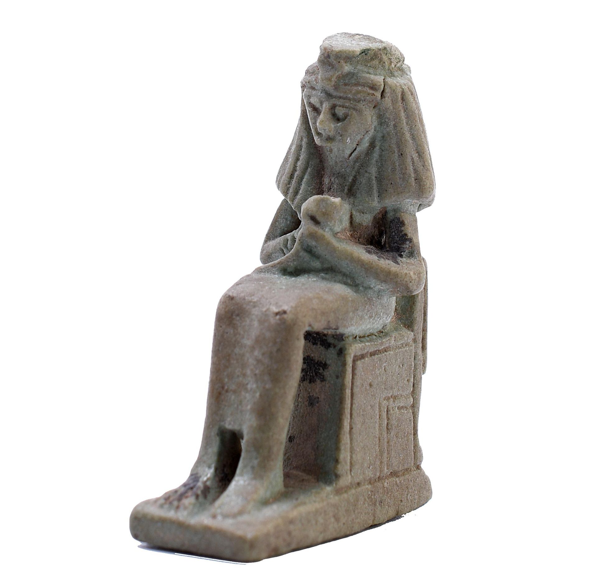 Egypt, a green faience amulet of Isis and Horus seated on a throne, Late Period.