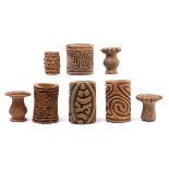 Columbia, a collection of five terracotta rolling seals and three earthenware stamps, possibly Quimb