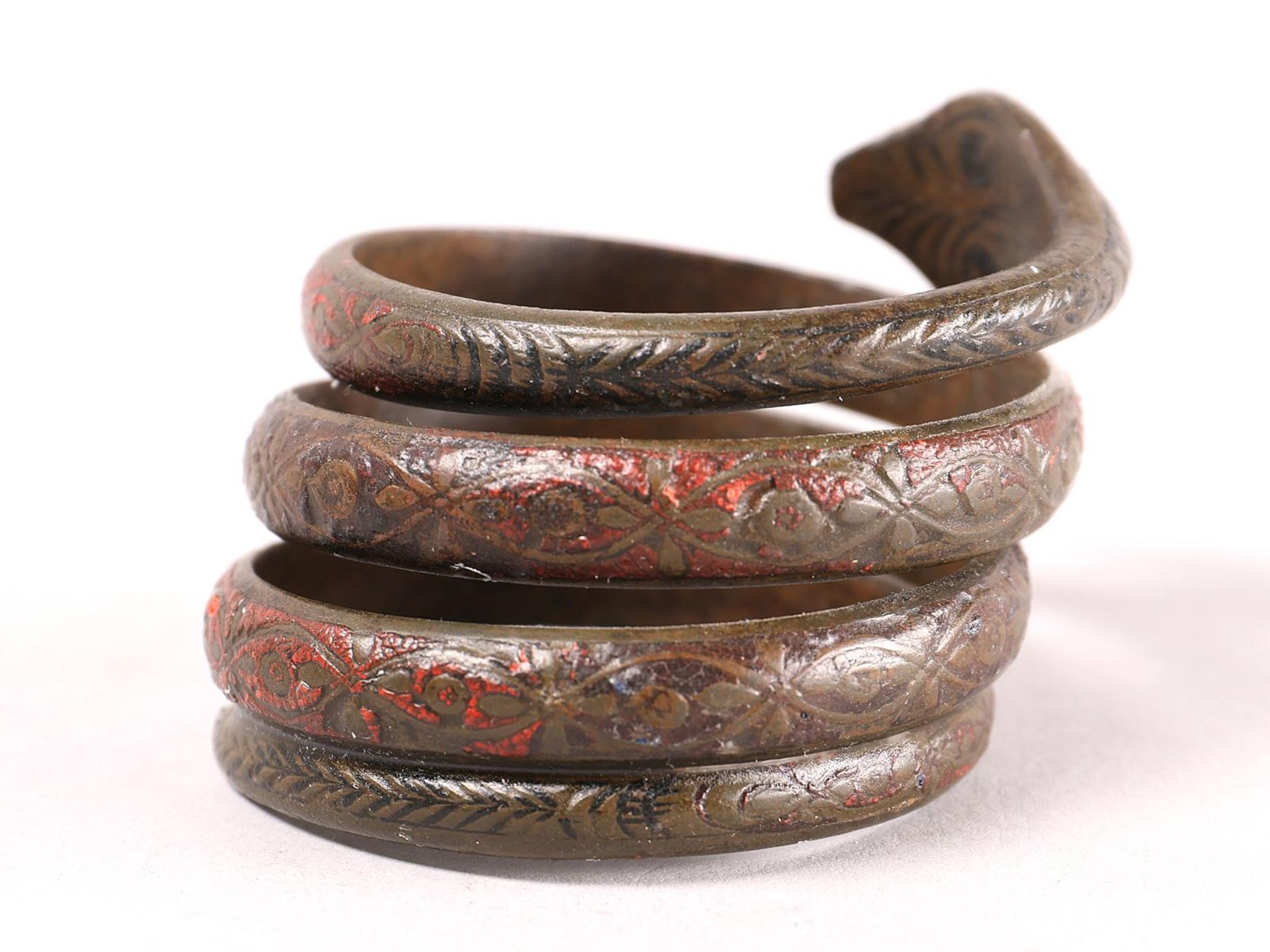 A antique coiled bronze snake armlet, - Image 4 of 6