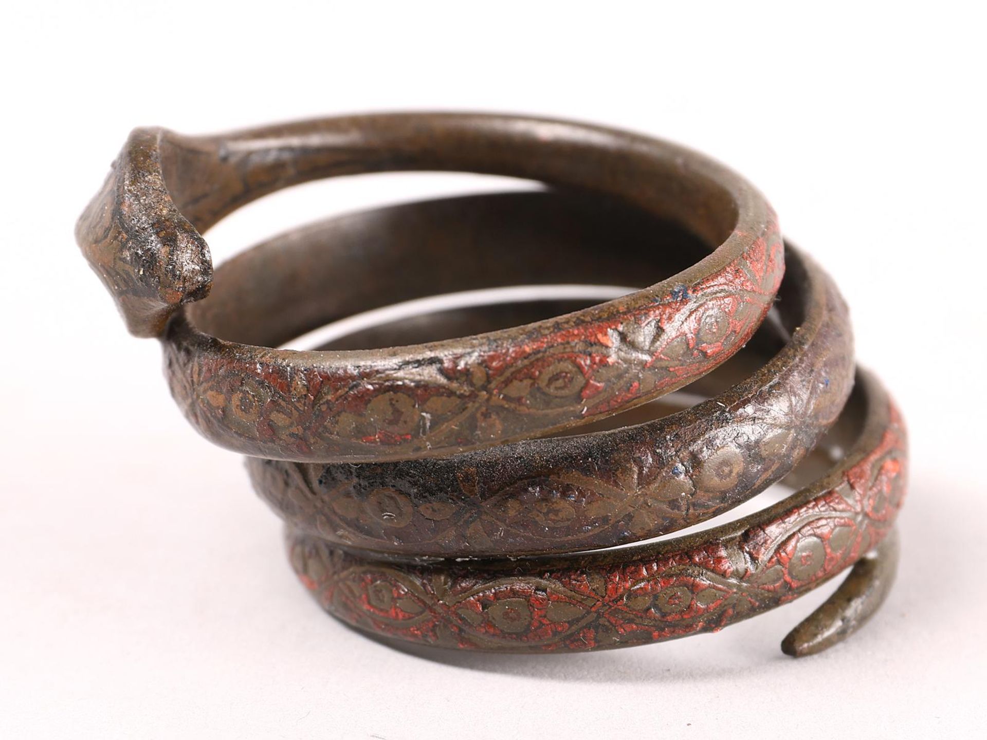 A antique coiled bronze snake armlet, - Image 3 of 6