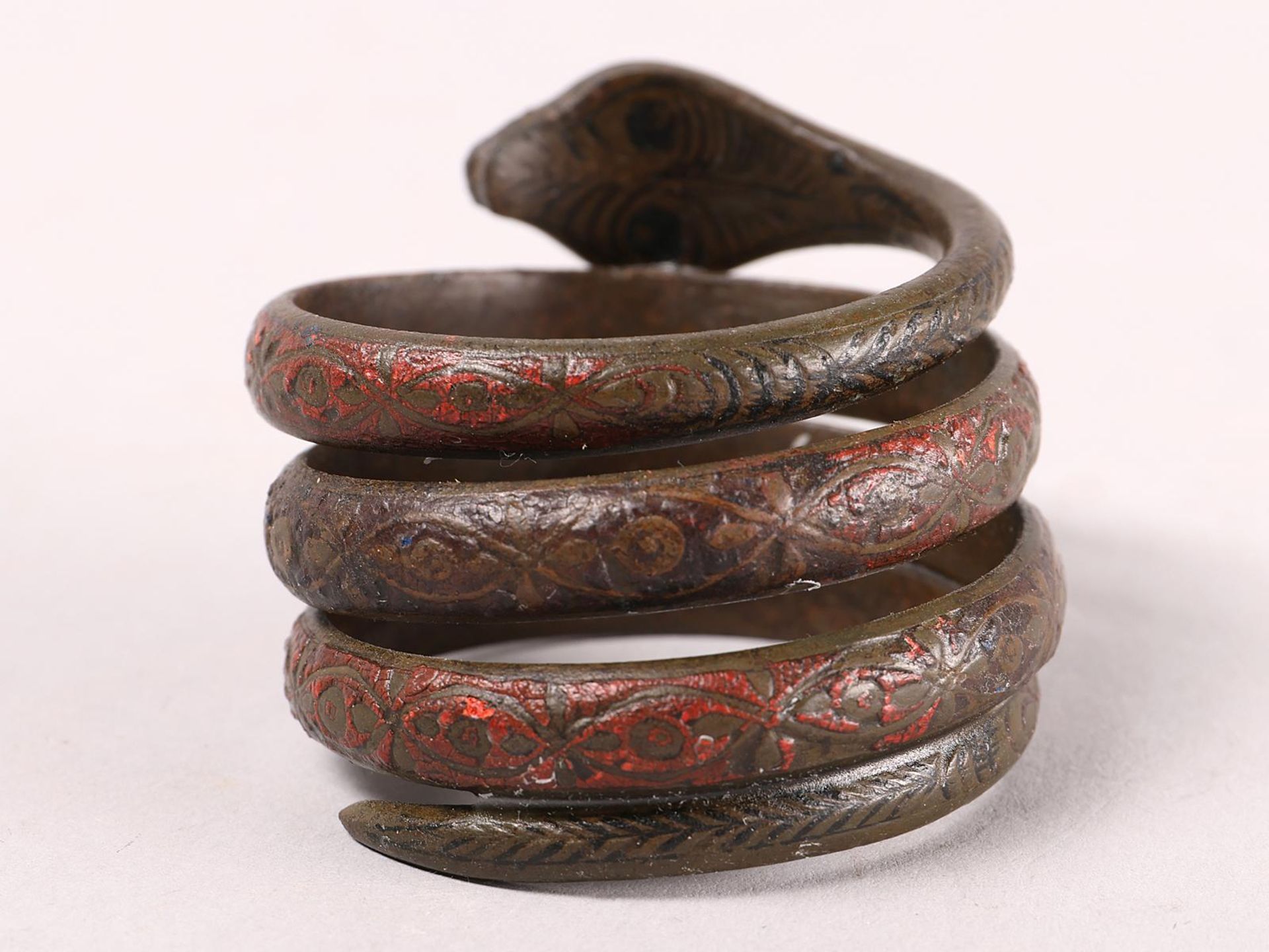 A antique coiled bronze snake armlet, - Image 6 of 6