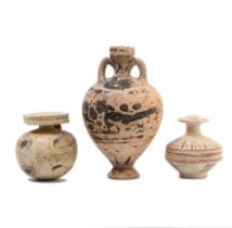 Corinthian, a earthenware arryballos quatre foil, 6th century BC and a terracotta small amphora.