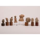 A collection of terracotta bustes in the Majapahit style.