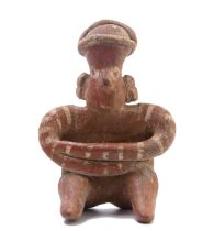 Mexico, a terracotta small Nayarit sculpture of a seated figure.