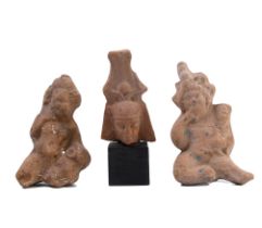 Possibly Roman, two earthenware sculptures of seated figures, possibly Bachanten and a Egypte, a ter