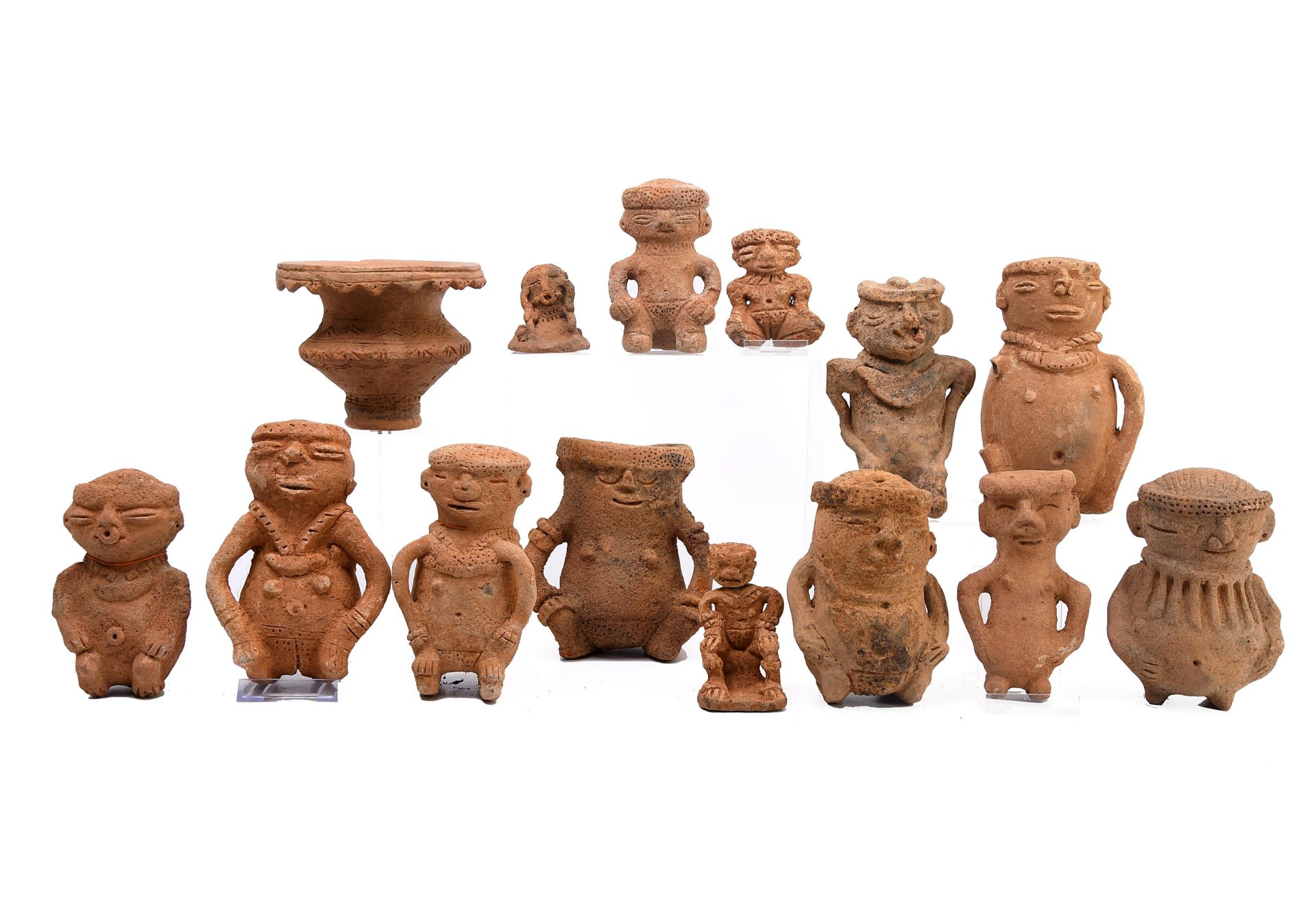 Colombia, Sinu region, a collection of fourteen various terracotta figures, ca. 1200-1400 AD.