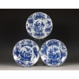 China, three blue and white porcelain deep saucer dishes, Kangxi period (1662-1722),