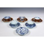 China, a small collection of café-au-lait-ground and a set of blue and white porcelain cups and sauc
