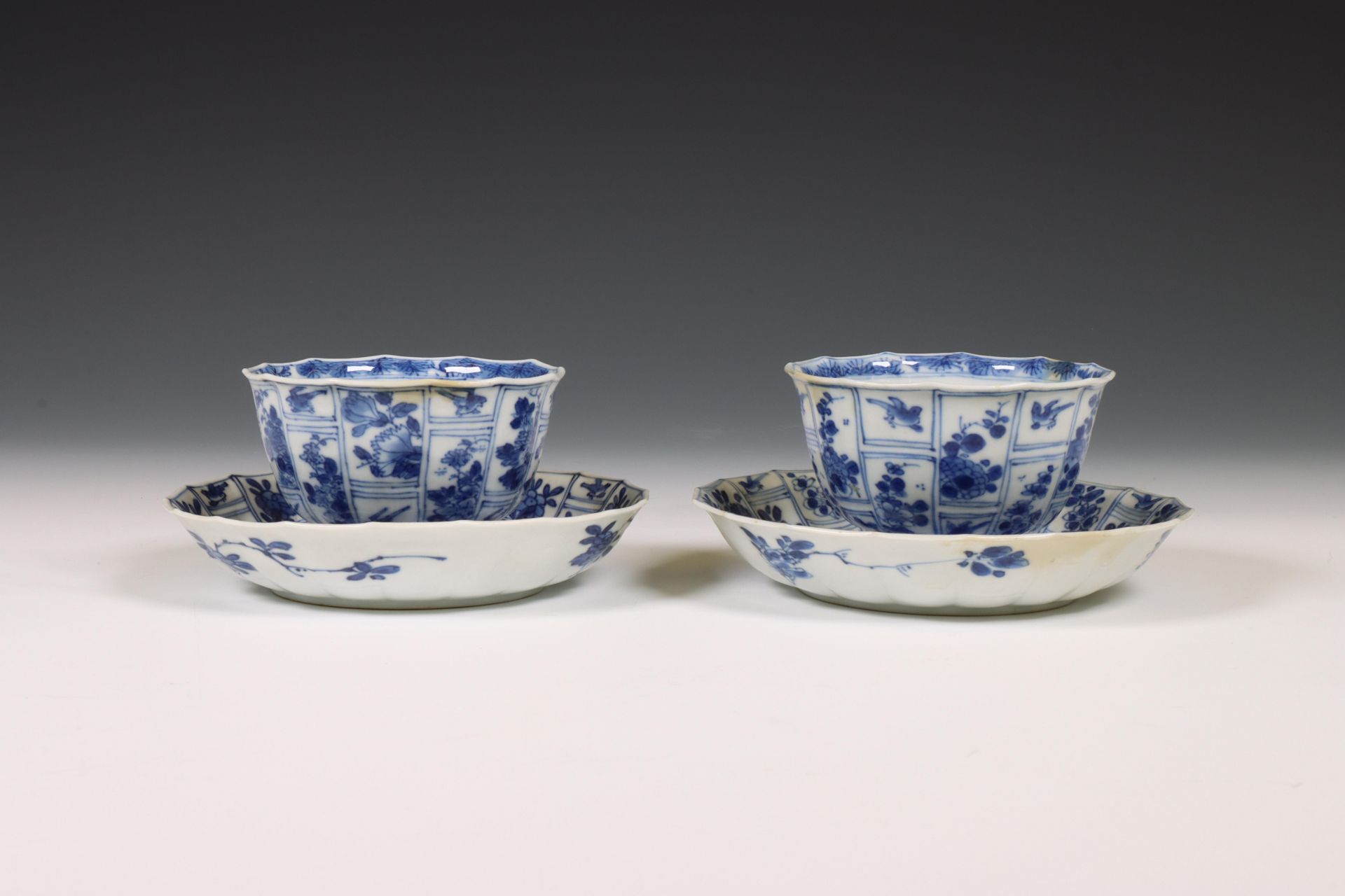 China, pair of blue and white porcelain cups and saucers, Kangxi period (1662-1722),