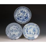 China, three blue and white porcelain 'figural' plates, 18th century