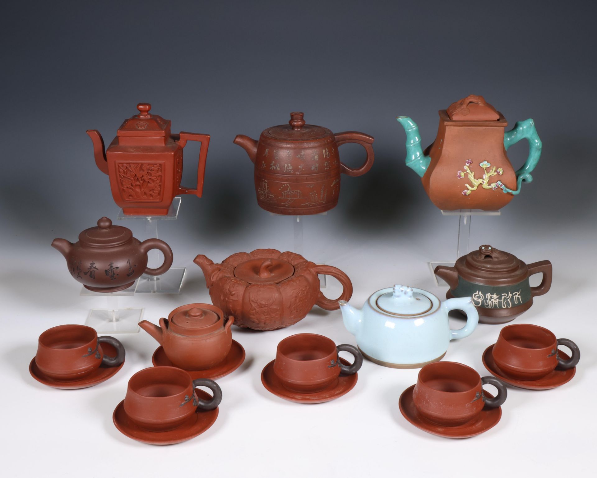 China, collection of Yixing earthenware teapots, cups and saucers,