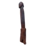Benin, Fon, a wooden phallic ritual object.