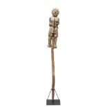 Tanzania-Malawi (?), a female figure, mounted on a pole