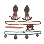 North East India, a pair of metal ear ornaments,