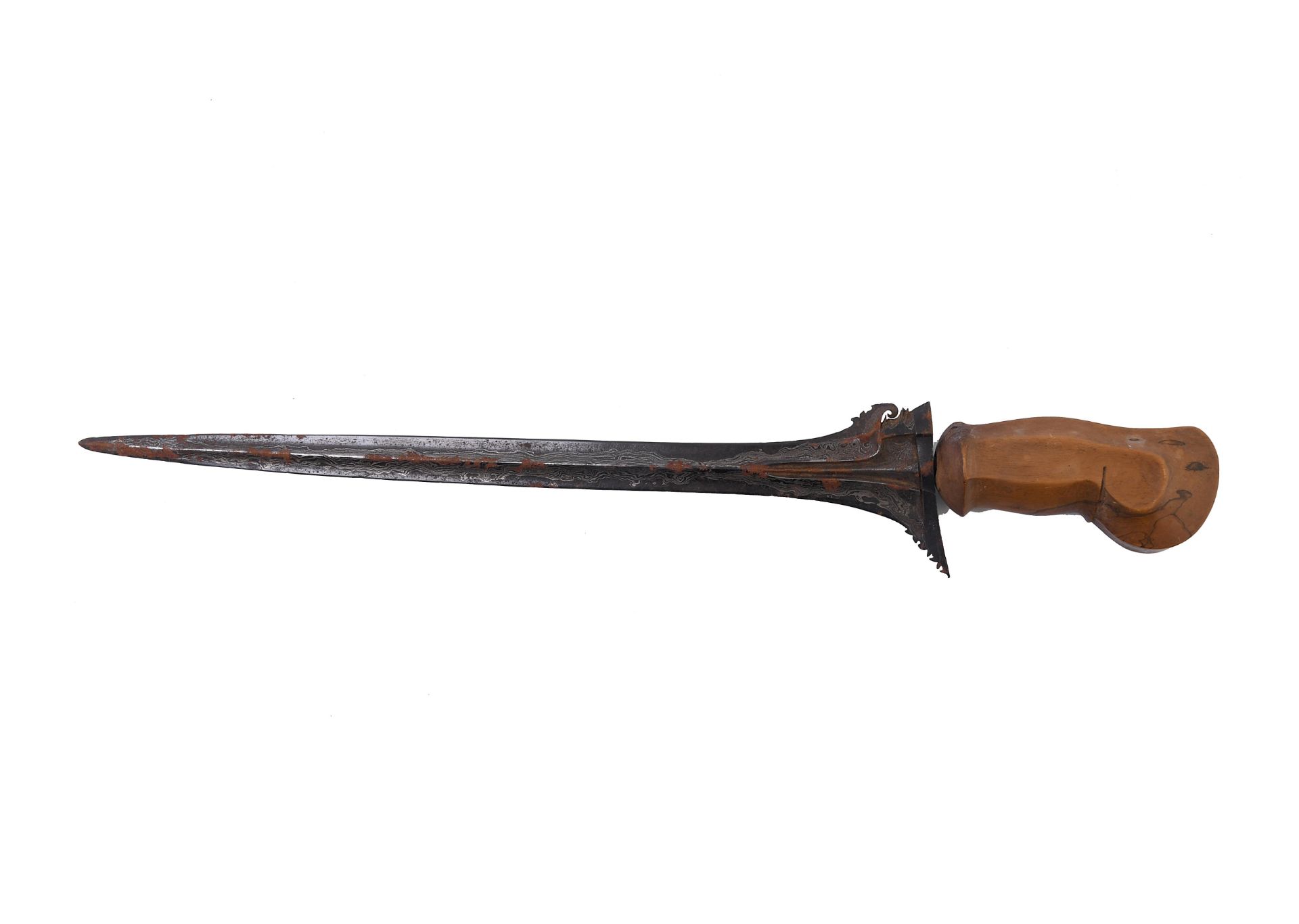 Bali, an old kris with an old wooden handle.