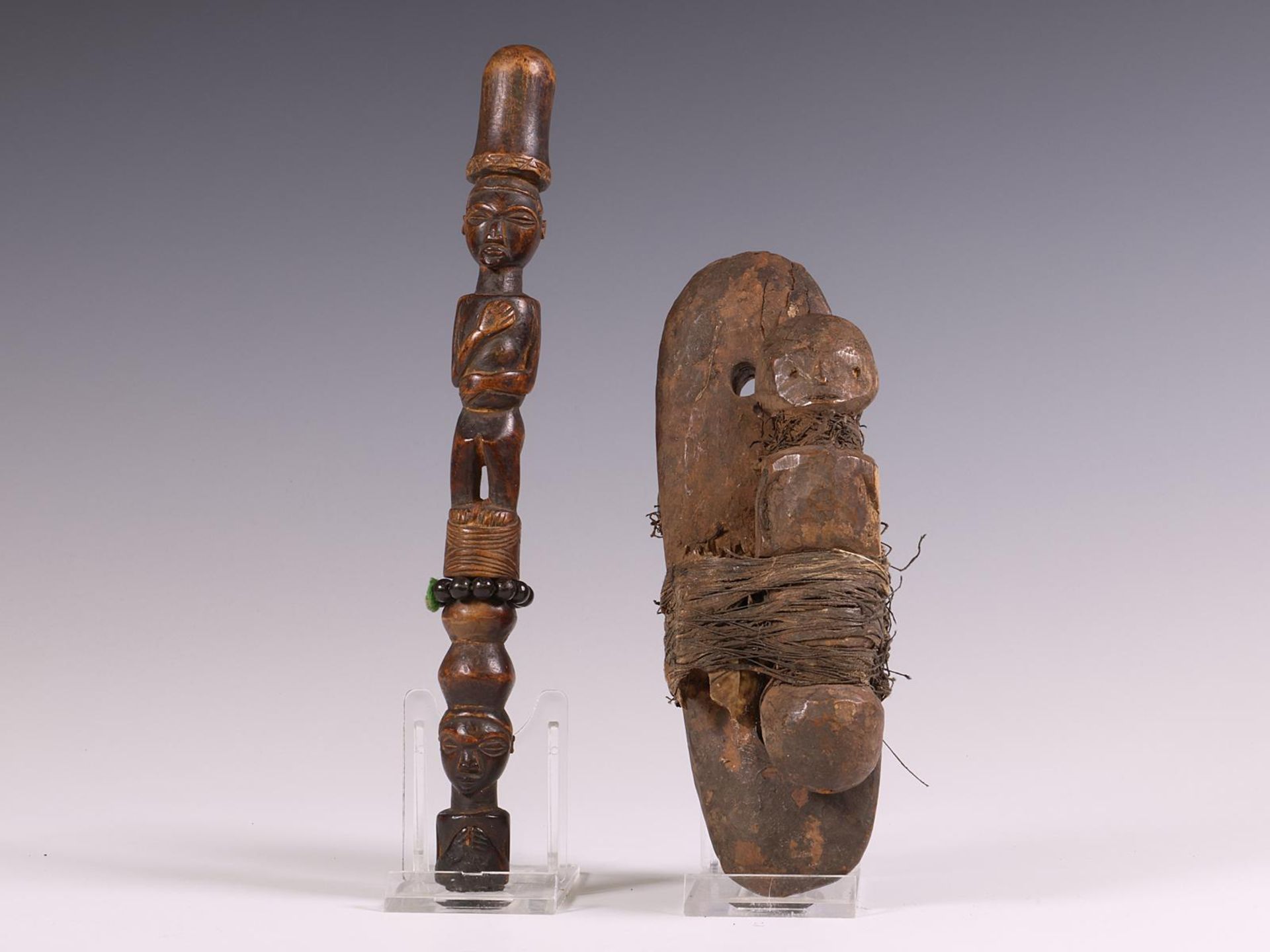 D.R. Congo, part of a ceremonial staff surmounted by a standing figure on top of a half figure and a