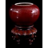 Porcelain sang de boeuf ball vase