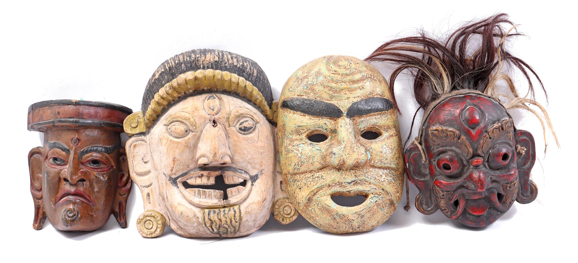 4 wooden masks