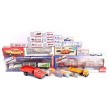 Lot of various tin and plastic trucks