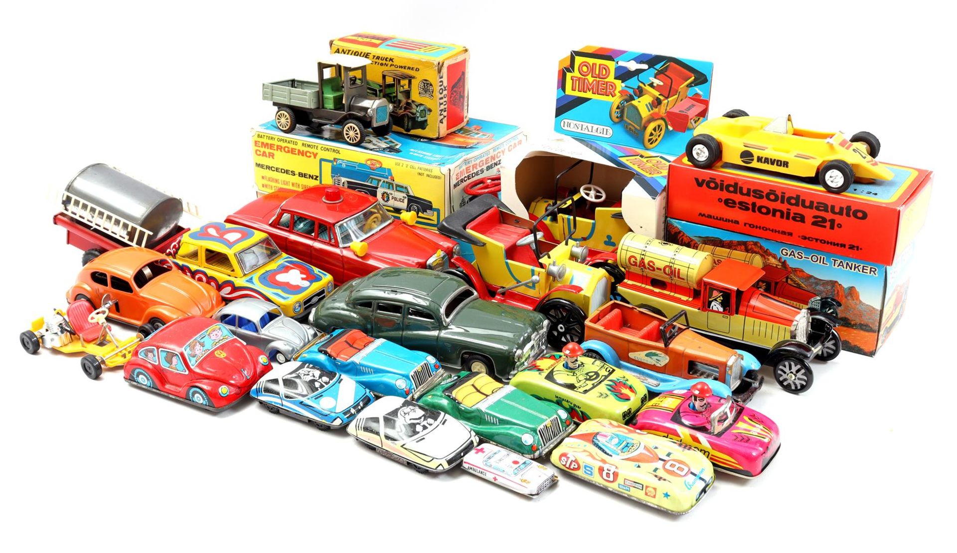 Box with various tin cars