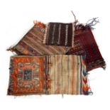 4 hand-knotted wool carpets/bags