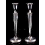 2 silver candlesticks