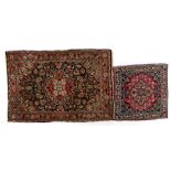 2 hand-knotted oriental carpets