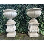 2 concrete garden vases