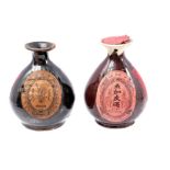 2 glazed porcelain bottles