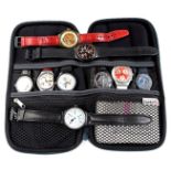 9 Swatch watches in various designs
