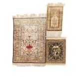 3 hand-knotted half-silk carpets