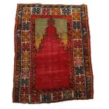 Old hand-knotted wool prayer rug