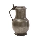 A pewter lidded jug