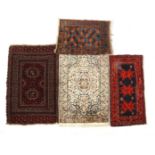 4 hand-knotted oriental carpets