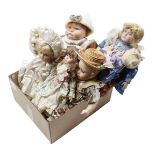 Box of porcelain dolls