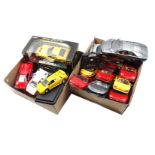 2 boxes with model metal cars