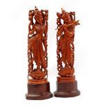 2 carved wooden statues, 20th