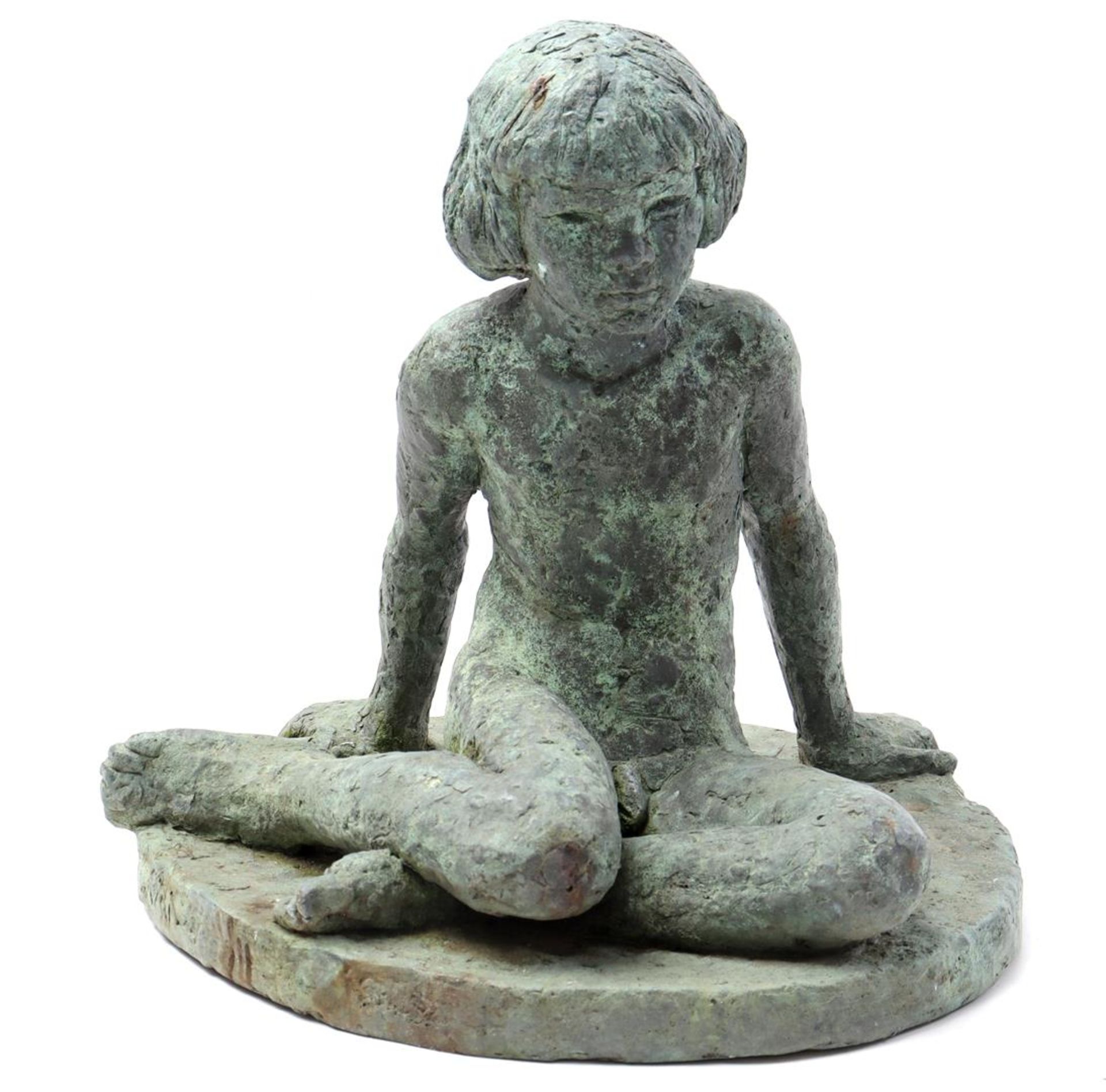 Bronze sculpture of a young man