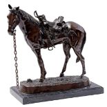 Metal sculpture of a saddled horse