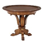 Round table with burr walnut veneer top, raised mahogany veneer edge