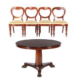 Mahogany dining area consisting of a round mahogany column leg table