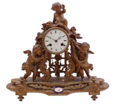 Zamak mantel clock with putti on top