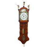 Antique Frisian tail clock in an oak case